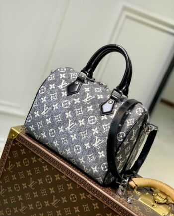 Loui Speedy Bandoulière 25 in a grey denim-like material .