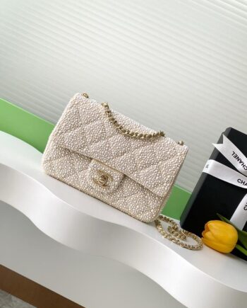 CC Classic Flap bag 25cm | Adorned with imitation pearls.