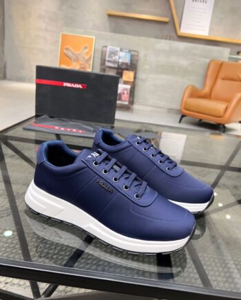 PRDA Lace-Up Stretch Knit Sneakers in blue.