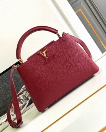 Loui Capucines bag . Burgundy Color