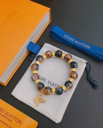 Loui Bracelet | beaded bracelet with a charm.