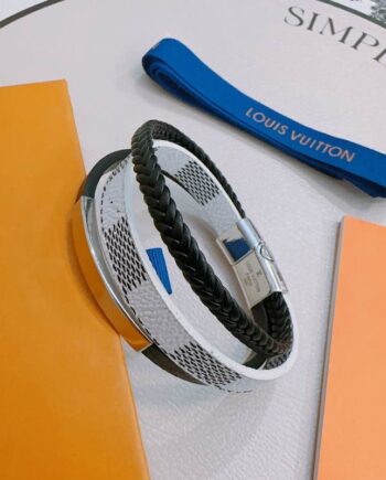 Loui Digit Bracelet. Black and white with silver-toned hardware.