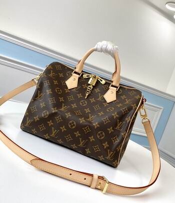 Loui Speedy Bandoulière in Monogram canvas. 30x21x17 cm