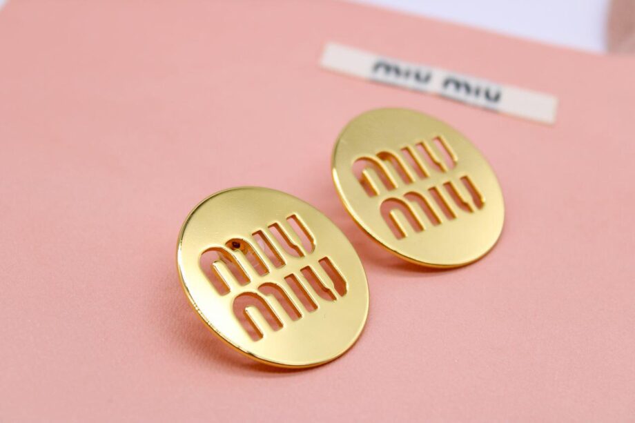 MM logo earings.
