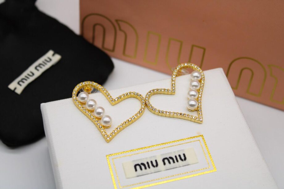 MM heart shaped earings.