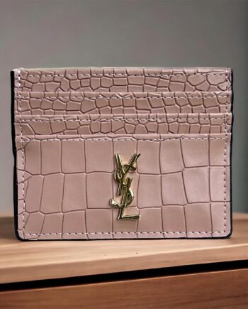 YS Card Holder in crocodile-embossed calfskin leather in a light, muted pink .