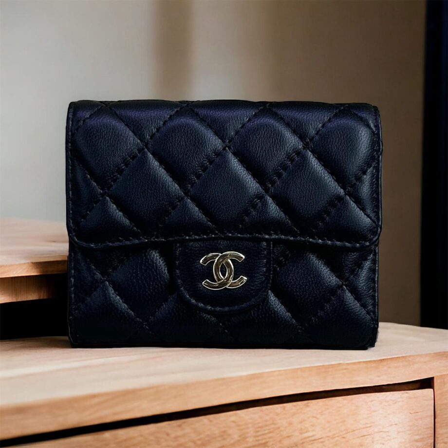 CC Classic Small Flap Wallet in black.