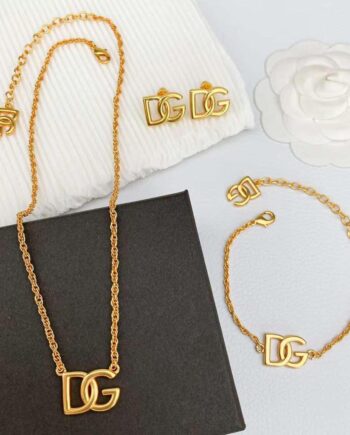 DG gold-toned jewelry set featuring the logo.