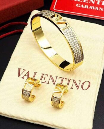 V Logo Signature bracelet and matching Signature earrings.