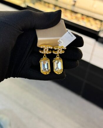 CC 23A Gold Pearl White Interlocking Logo Earrings.