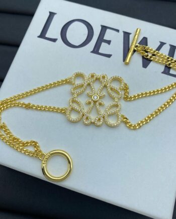 Loe Anagram bracelet (silver and gold).