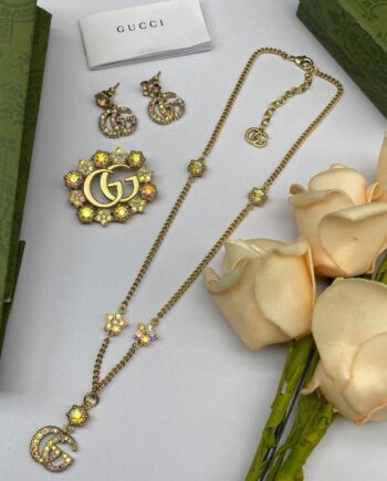 GG Metal double G necklace with earings and brooch.