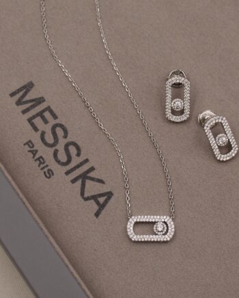 Mesika Move Collection necklace with earings.