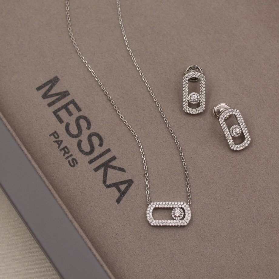 Mesika Move Collection necklace with earings.