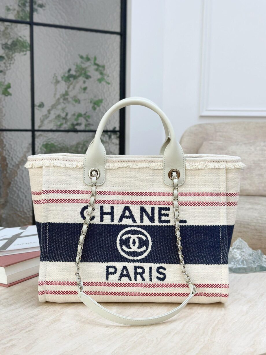 CC Deauville Tote Bag in a combination of beige/off-white and navy blue, with red stripes as an accent.