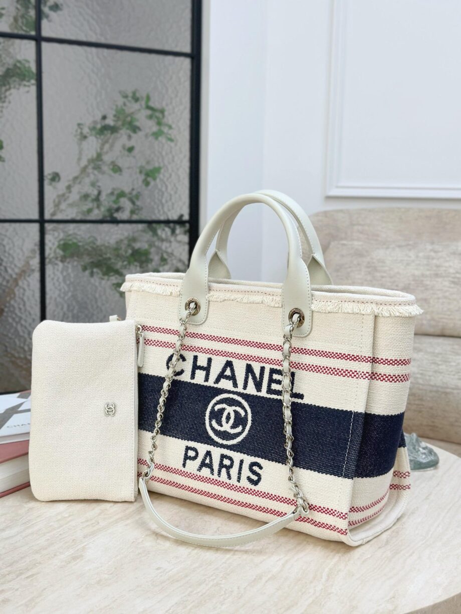 CC Deauville Tote Bag in a combination of beige/off-white and navy blue, with red stripes as an accent.