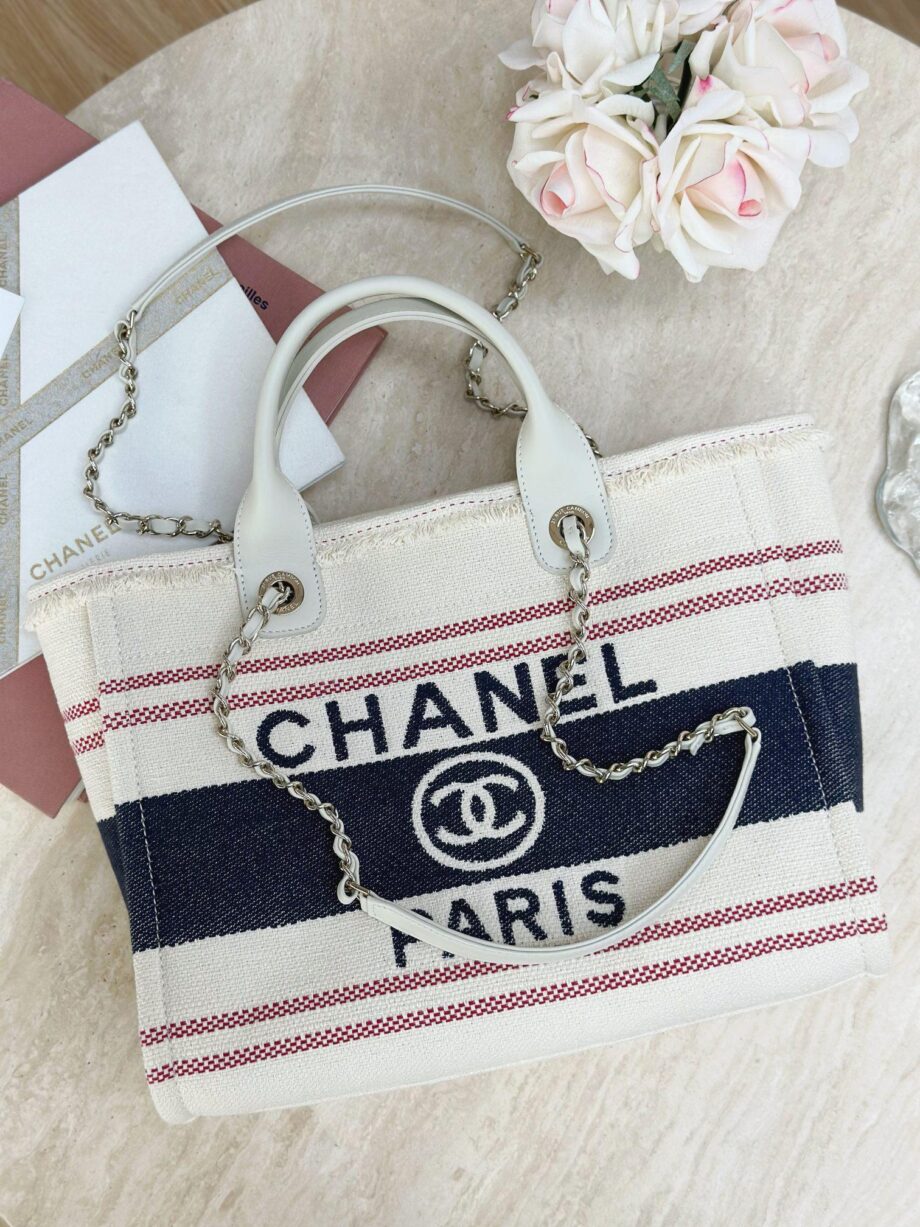 CC Deauville Tote Bag in a combination of beige/off-white and navy blue, with red stripes as an accent.