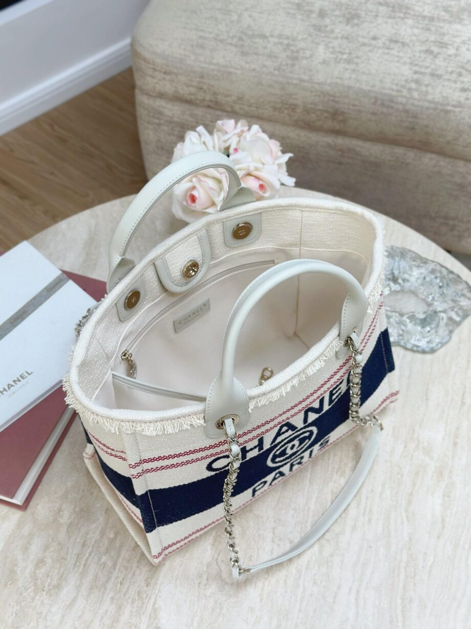 CC Deauville Tote Bag in a combination of beige/off-white and navy blue, with red stripes as an accent.