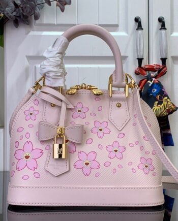 Loiu Alma BB bag in a light pink color, pink cherry blossom motifs.