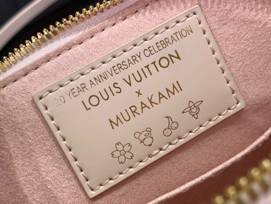Loiu Alma BB bag in a light pink color, pink cherry blossom motifs.