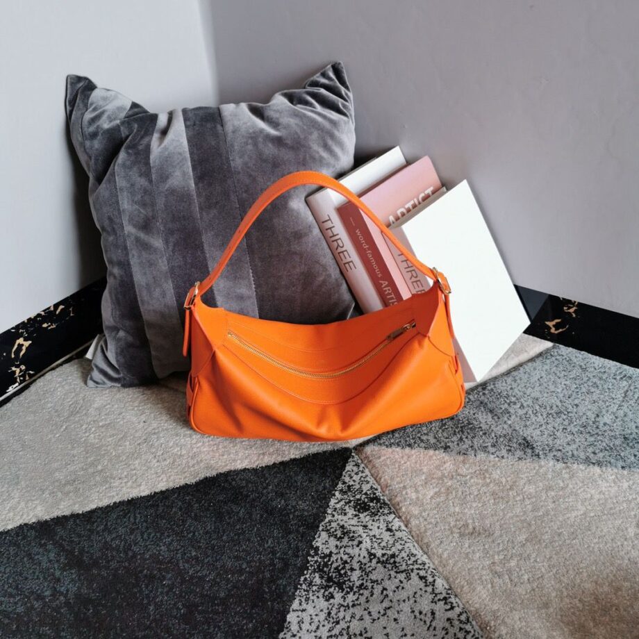 CLINE Romy Medium Bag in bright orange leather.