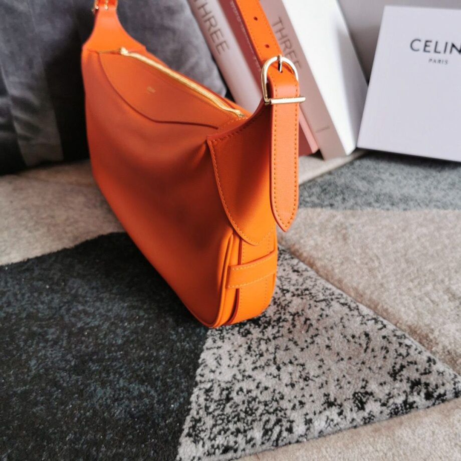 CLINE Romy Medium Bag in bright orange leather.