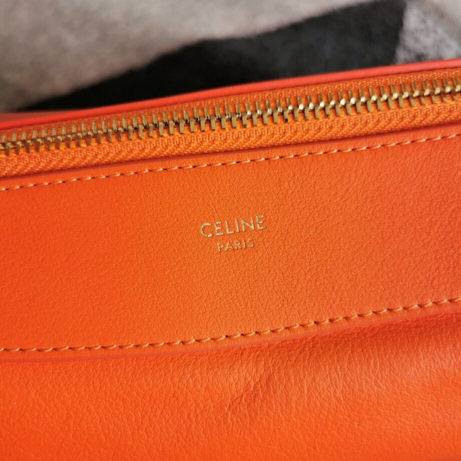 CLINE Romy Medium Bag in bright orange leather.