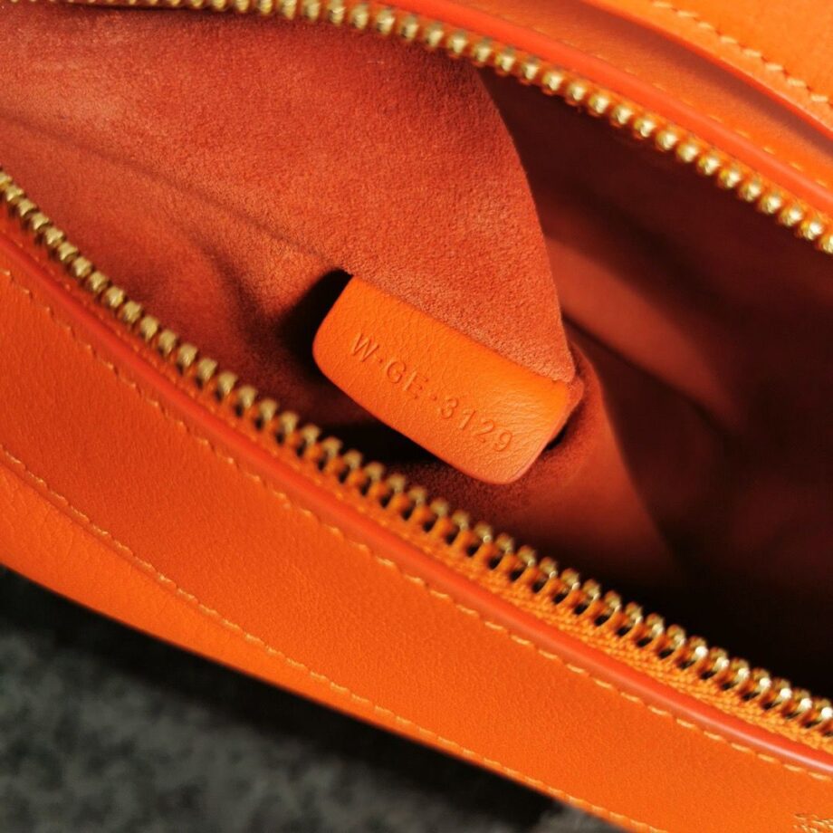 CLINE Romy Medium Bag in bright orange leather.
