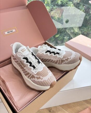 MM mesh-panelled sneakers | beige with white and black accents.