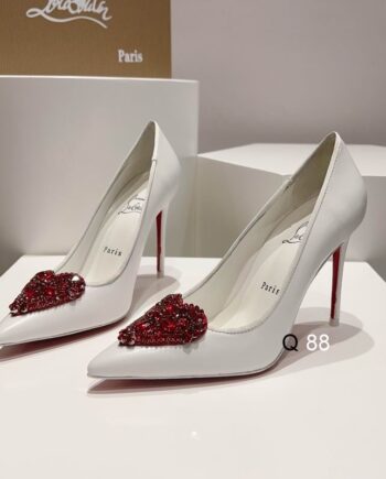 CL White Court Shoes | heart-shaped crystal embellishment on the toe.