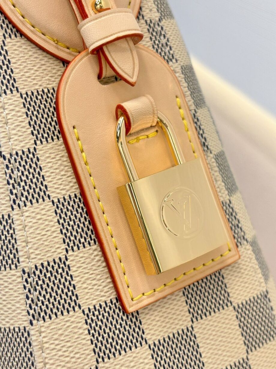 Loiu hobo style shoulder bag | slouchy silhouette, Damier Azur pattern.