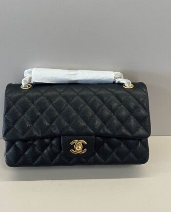 CC jumbo Classic Flap Bag, in Black Caviar leather with Gold Hardware.