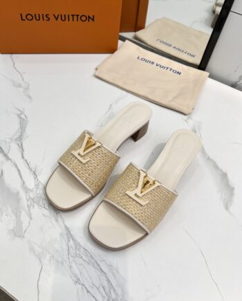 Loui Woven Sandal | gold tone logo on the strap.