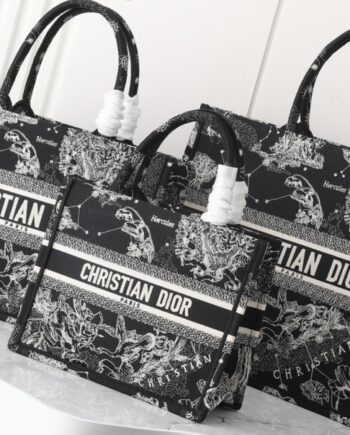 CD Book Tote | fully embroidered with iconic motifs .