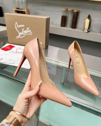 CD Pointed toe nude heels.