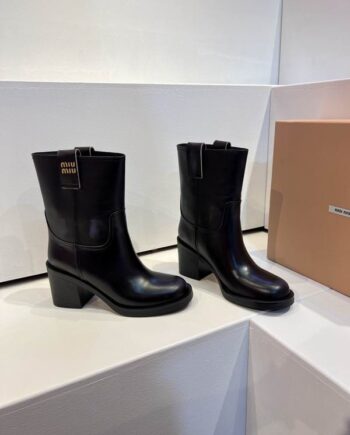 MM Leather Boot | Mid Calf height in black.