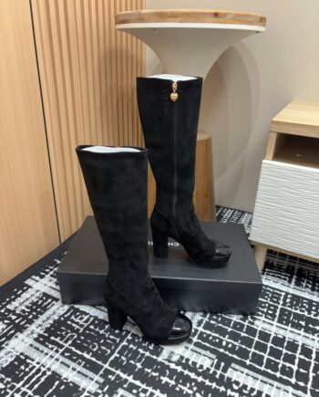 CC high boots | black suede with patent leather cap toe and chunky heels.